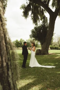 candid photo of bride and groom saying their private vows at Bella Cosa wedding venue